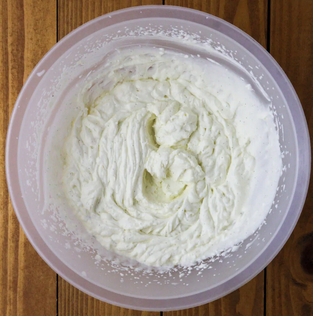 image showing how to whip heavy cream with sugar and vanilla paste