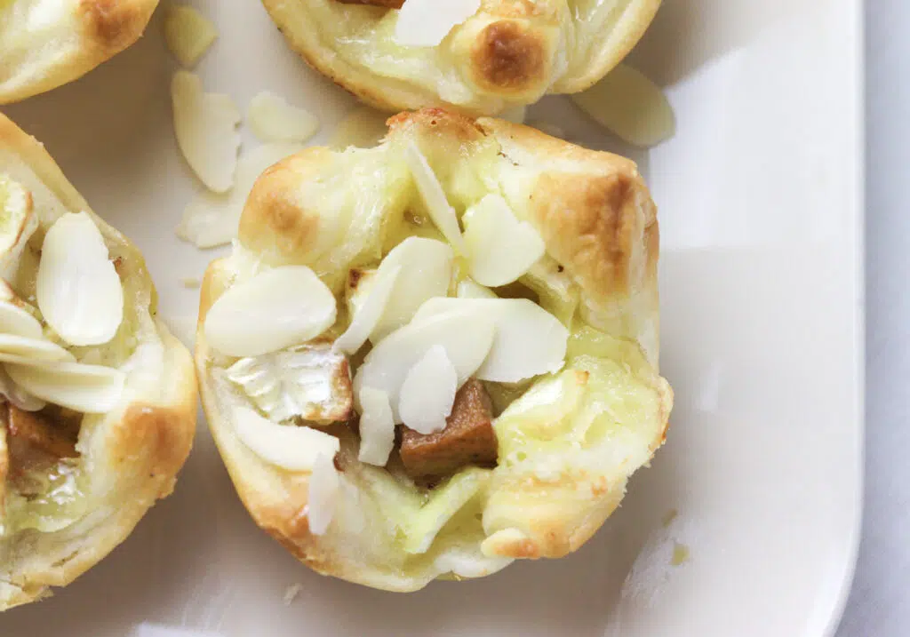 image of freshly baked bites drizzled with honey and almonds