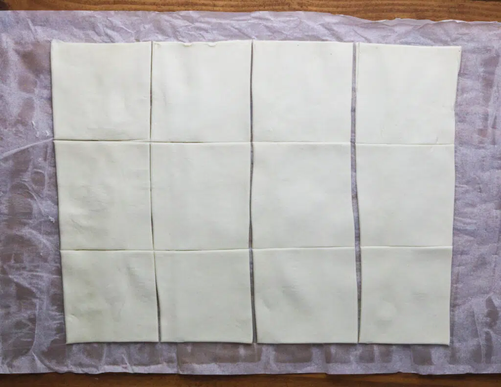 image showing how to slice the puff pastry sheet into smaller pieces to fit the muffin tin