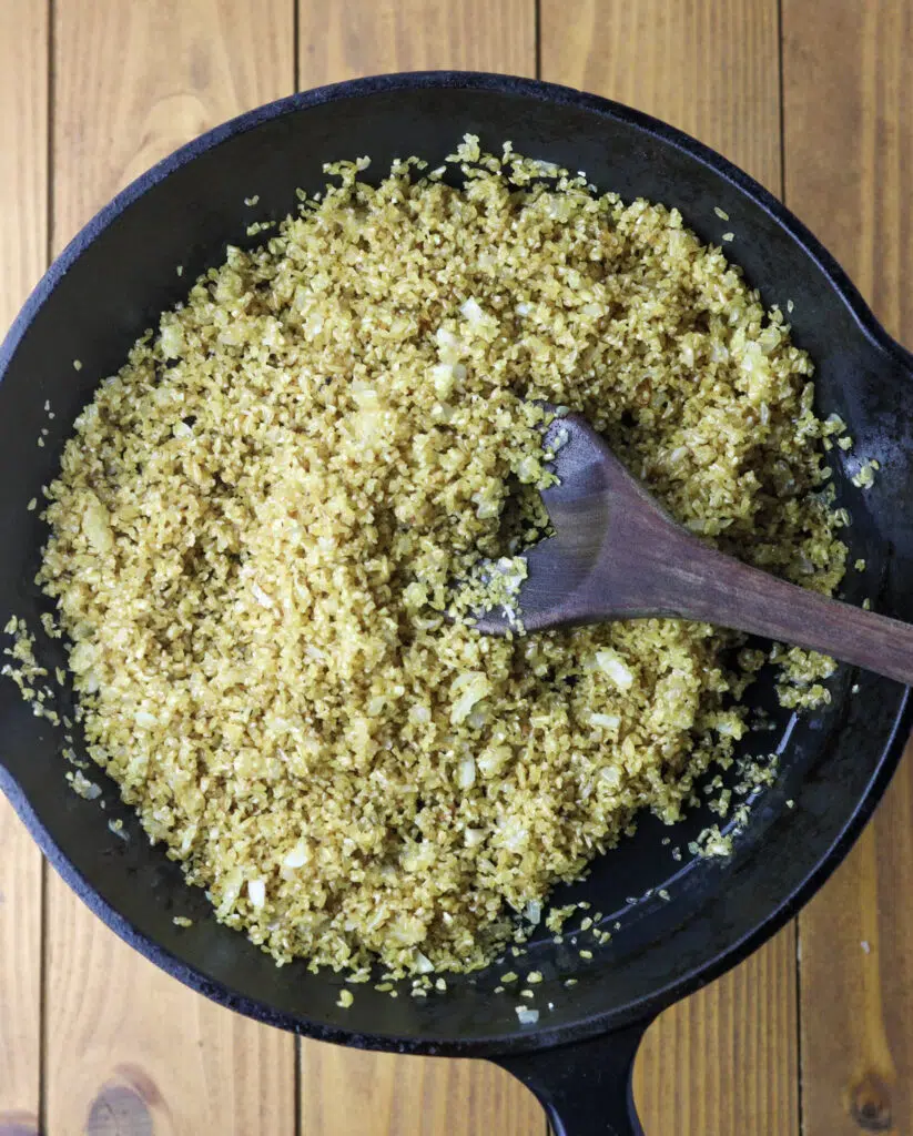 Image showing how to quickly toast the bulgur before adding vegetable stock for risotto